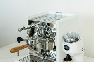 a coffee machine sitting on top of a white counter